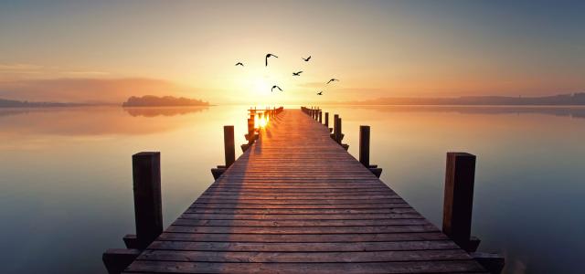 Wooden jetty during sunset